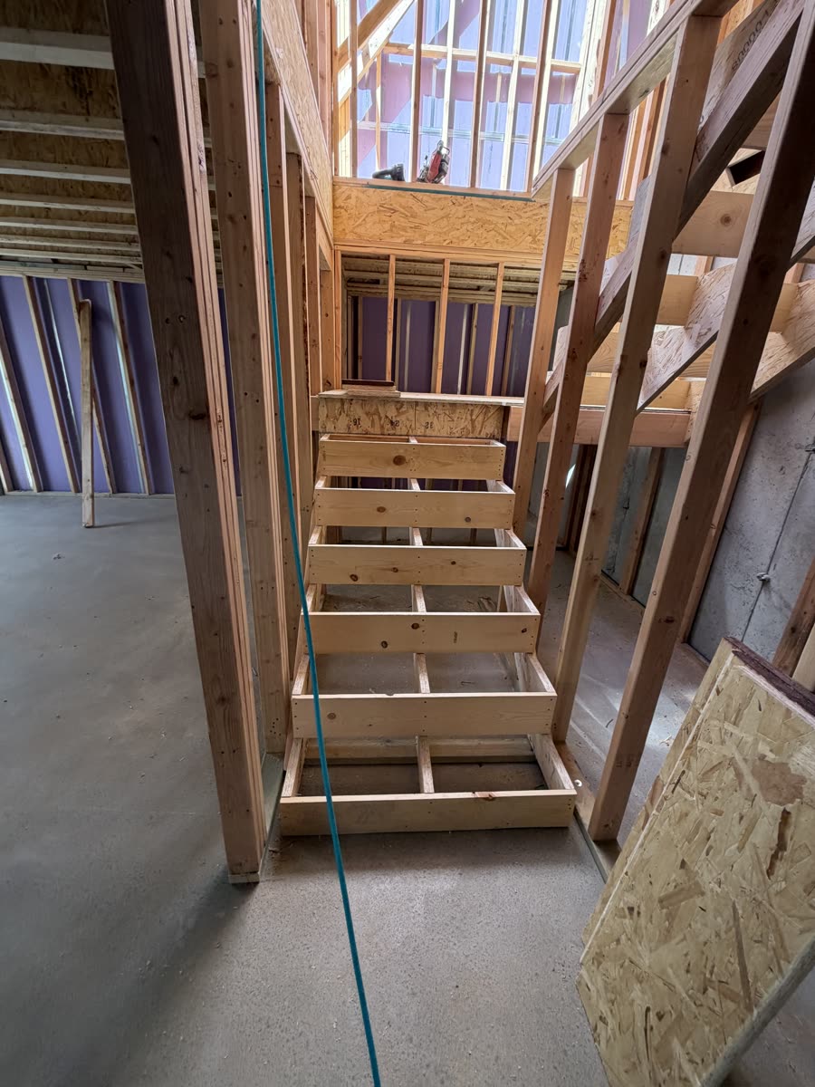 Framed staircase inside a custom home build in Utah